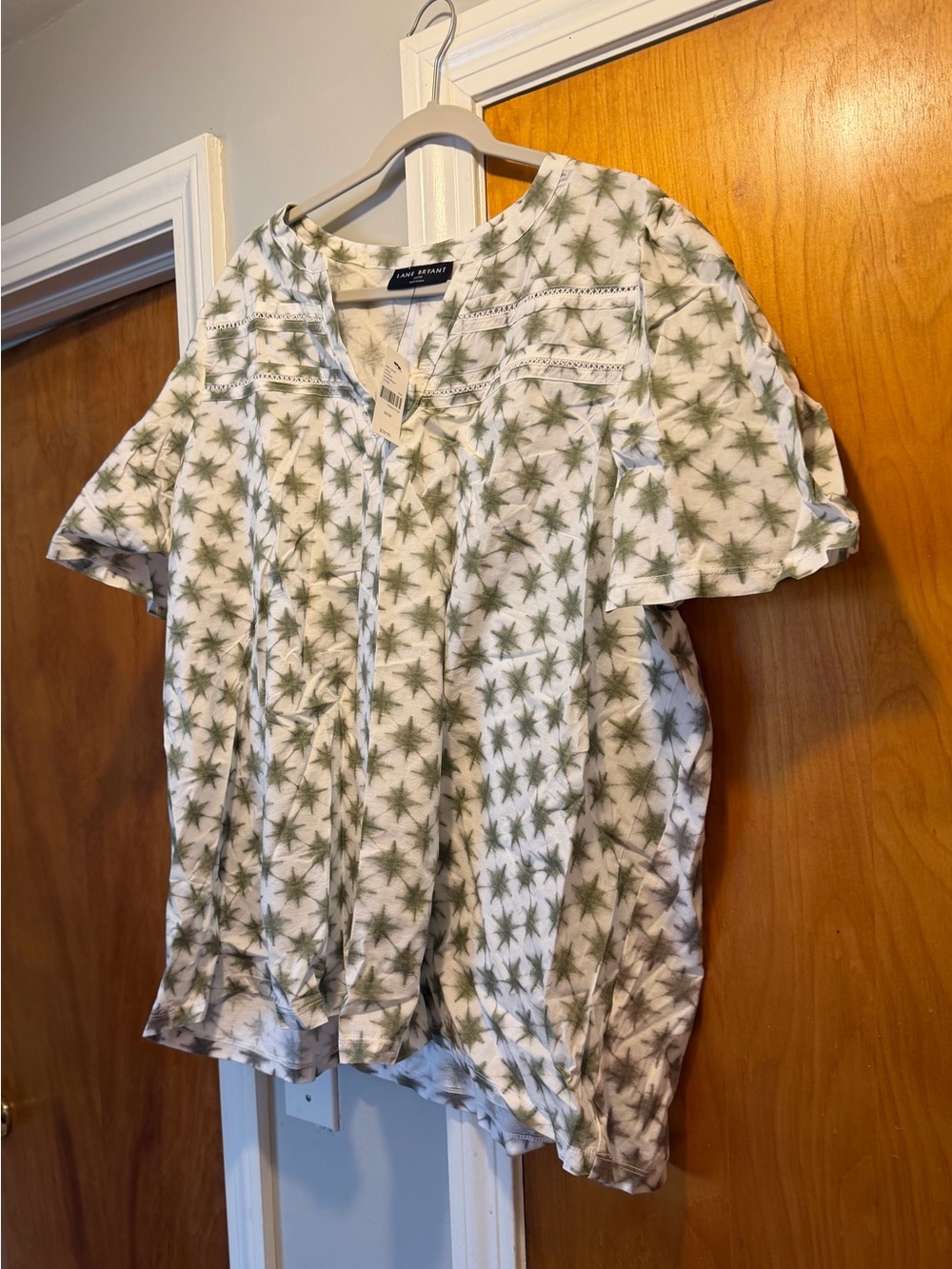 Lane Bryant White Top with Olive Starburst Print